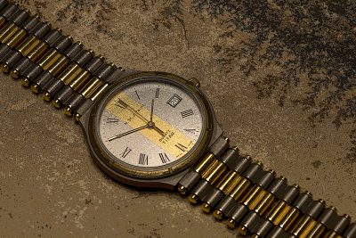 Product Photography - Old N St J Paint wrist watch on piece of sandstone with trace of fossils